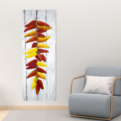 Rope of peppers with wood background