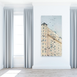 Toile 24 x 48 - Oiseaux volants devant un immeuble