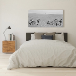 Canvas 24 x 48 - Zebras in the savannah