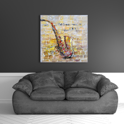 Toile 36 x 36 - Saxophone sur mur de brique