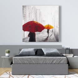 Canvas 48 x 48 - Passersby with umbrellas walking down the street