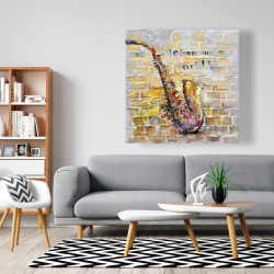 Toile 48 x 48 - Saxophone sur mur de brique