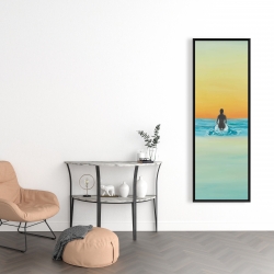 Framed 16 x 48 - A surfer swimming by dawn