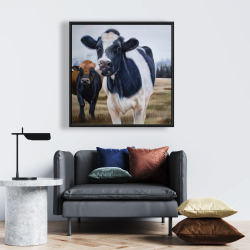 Framed 24 x 24 - Two cows eating grass