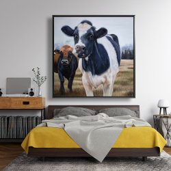 Framed 48 x 48 - Two cows eating grass