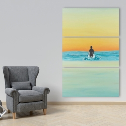 Canvas 40 x 60 - A surfer swimming by dawn