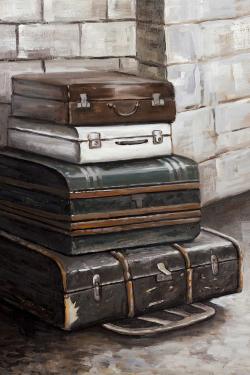 Four old traveling suitcases