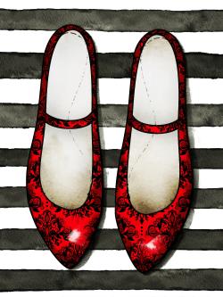 Red glossy shoes on striped background