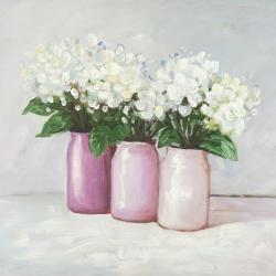 Fleurs d'hortensia dans des vases roses