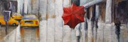 Parapluie rouge dans la rue