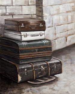 Four old traveling suitcases