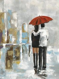 Couple marchant sous leur parapluie