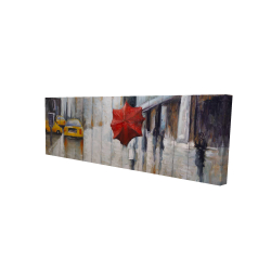 Parapluie rouge dans la rue