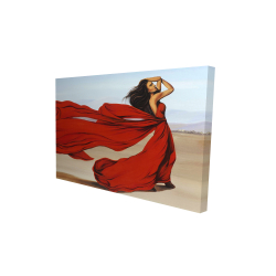 Woman with a long red dress in the desert