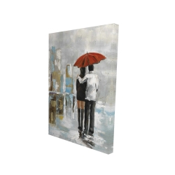 Couple marchant sous leur parapluie