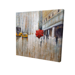 Parapluie rouge dans la rue