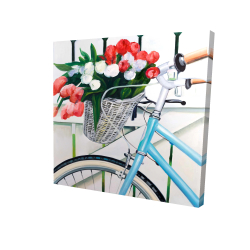 Bicyclette avec panier de tulipes