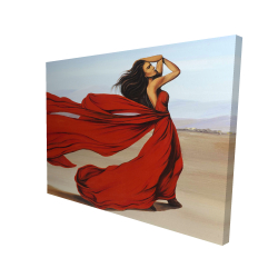 Woman with a long red dress in the desert