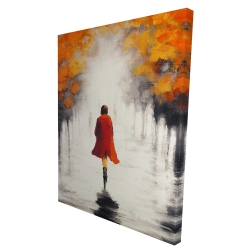 Woman with a red coat by fall