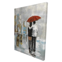 Couple marchant sous leur parapluie