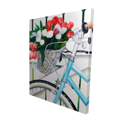 Bicyclette avec panier de tulipes