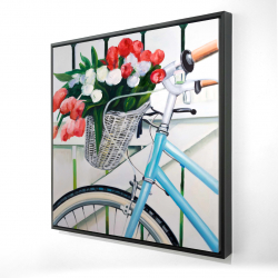 Bicyclette avec panier de tulipes