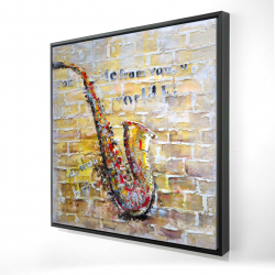 Saxophone sur mur de brique