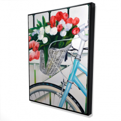 Bicyclette avec panier de tulipes