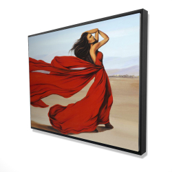 Woman with a long red dress in the desert