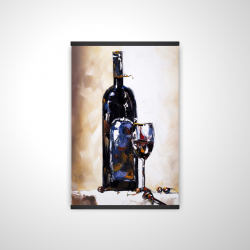 Bottle and a glass of red wine