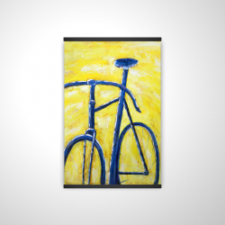 Bicyclette bleue sur fond jaune