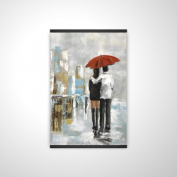 Couple marchant sous leur parapluie