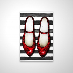 Red glossy shoes on striped background