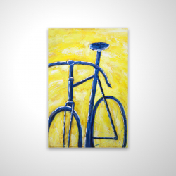 Bicyclette bleue sur fond jaune