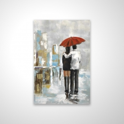 Couple marchant sous leur parapluie