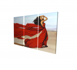 Woman with a long red dress in the desert