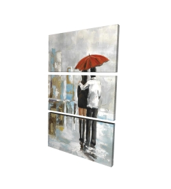 Couple marchant sous leur parapluie