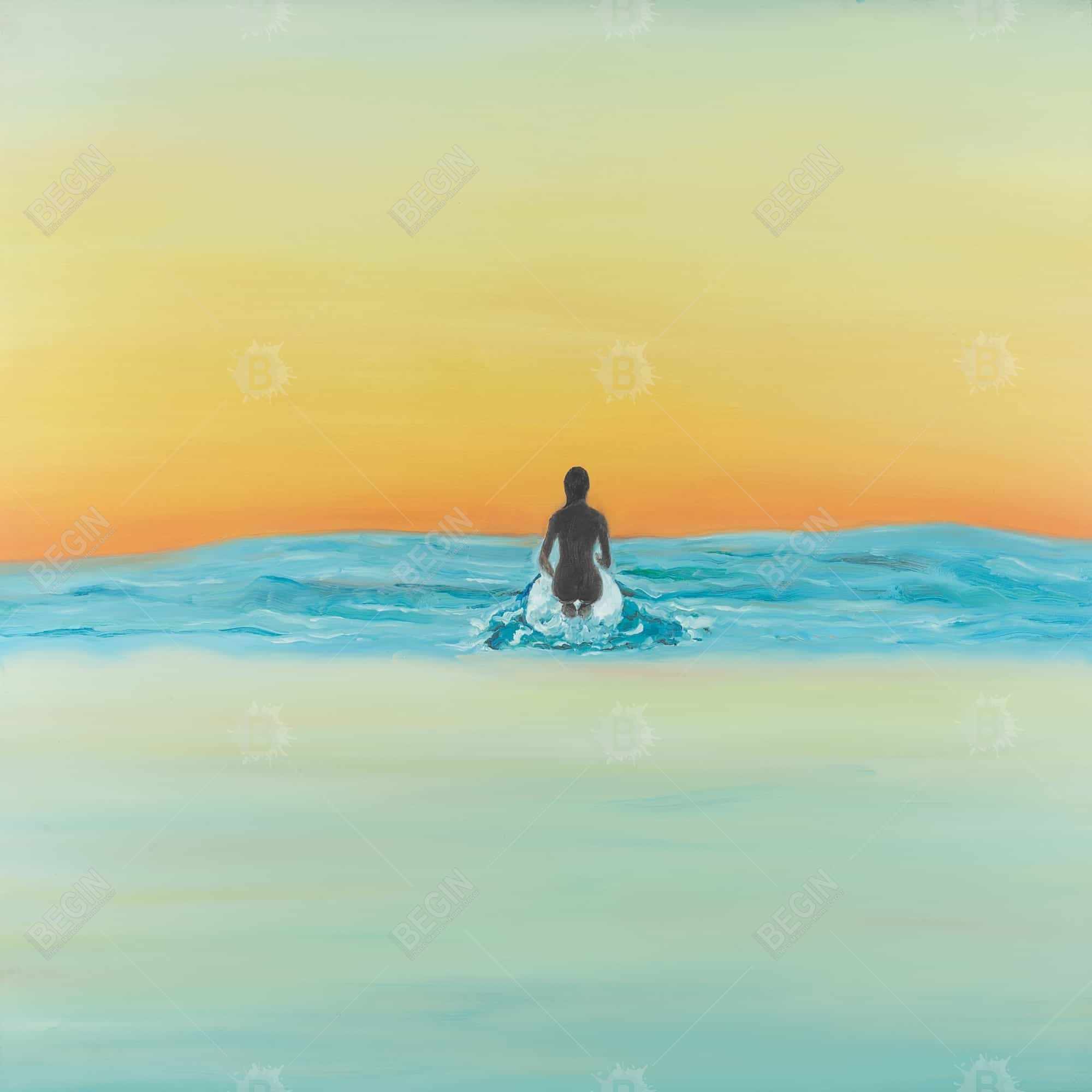 A surfer swimming by dawn